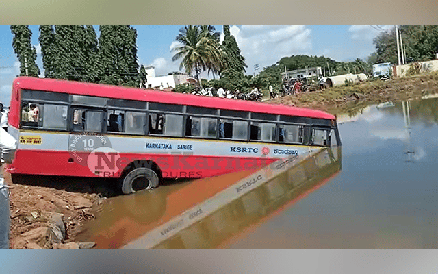 KSRTC bus plunges into water