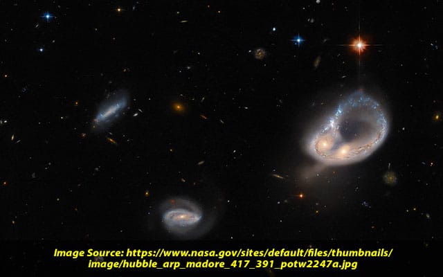 Hubble captures unusual galaxy merger in ancient universe