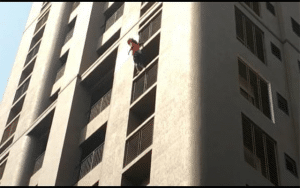 Udupi: Jyothiraj climbs 25-storey building at Brahmagiri
